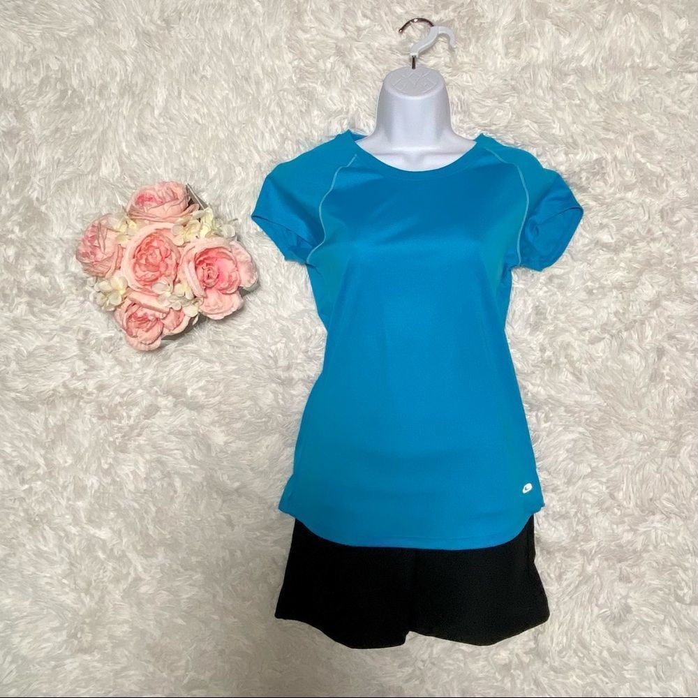 Champion women’s blue Active semi fitted workout top, size S